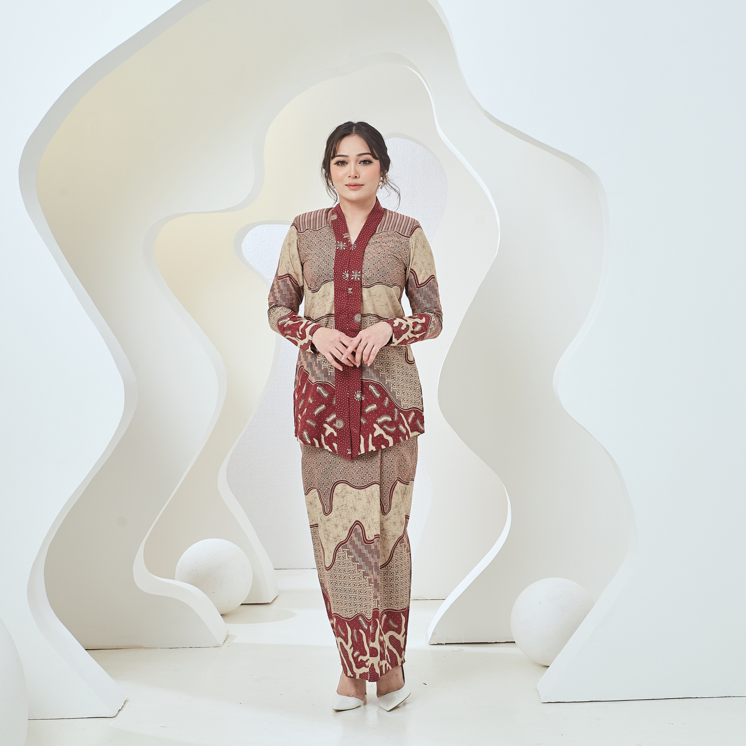 Swastika Raya 2024 Lady In Maroon